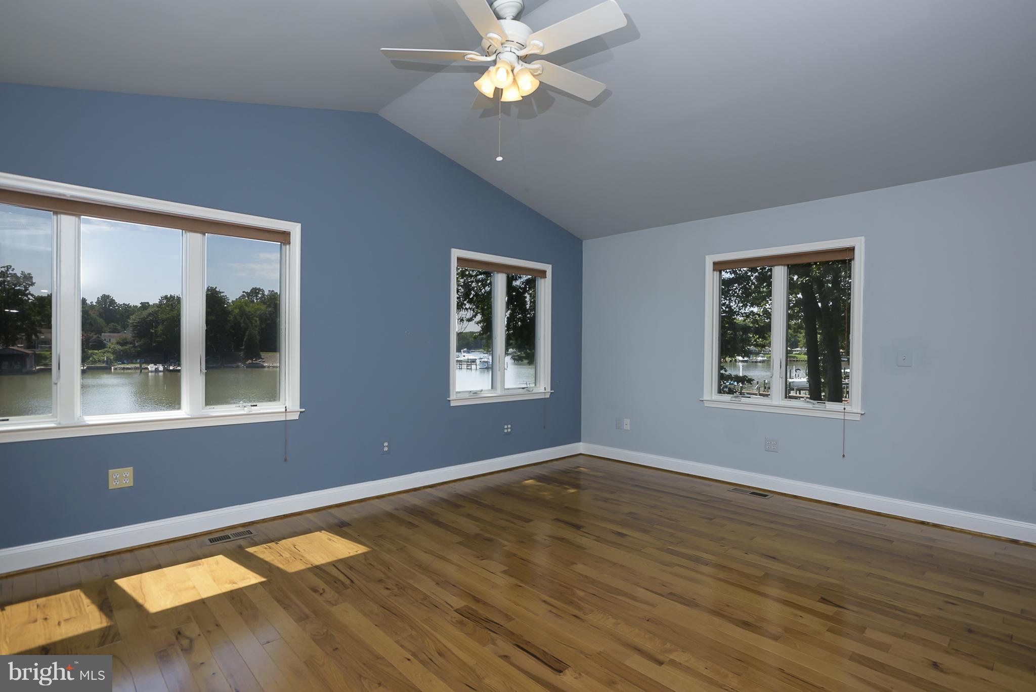 8216 Riverside Drive Pasadena, MD 21122 - Photo 16 of 30 Master bedroom with cathedral ceilings