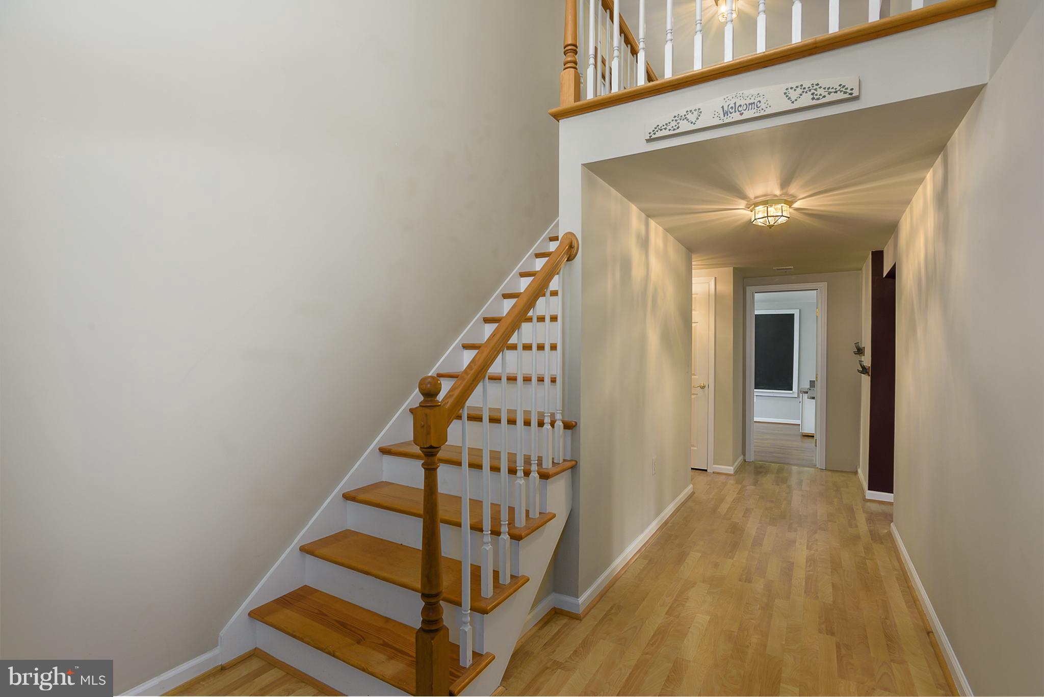 8216 Riverside Drive Pasadena, MD 21122 - Photo 7 of 30 2 story foyer