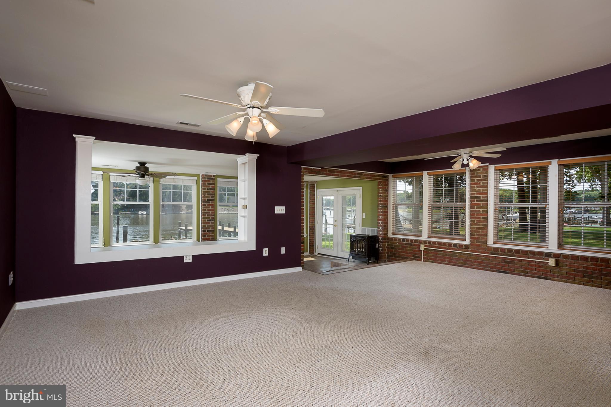 8216 Riverside Drive Pasadena, MD 21122 - Photo 10 of 30 Spacious family room with waterviews
