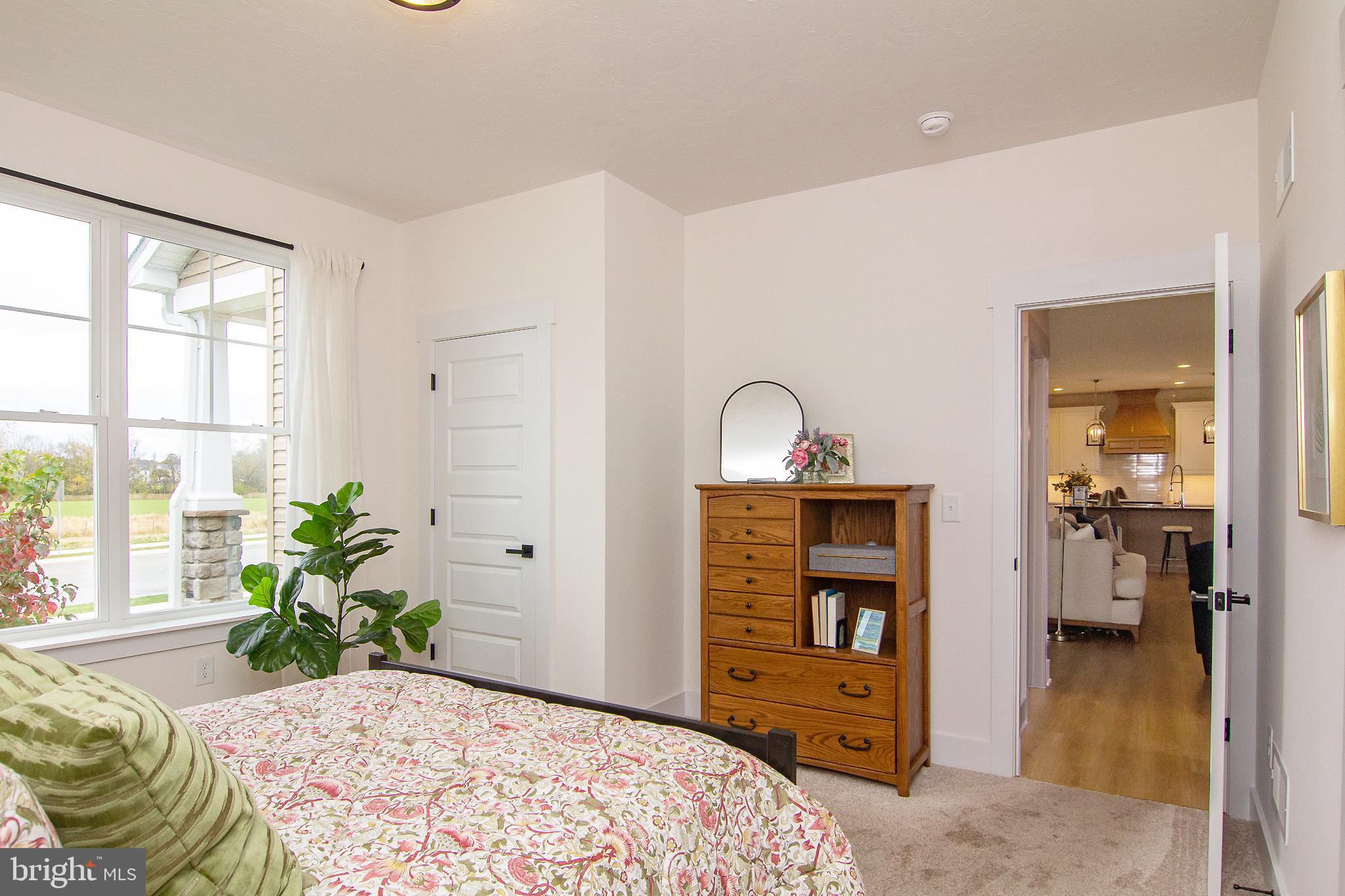 3913 St Pauls Road Manchester, MD 21102 - Photo 23 of 38 a bedroom with a bed and a dresser