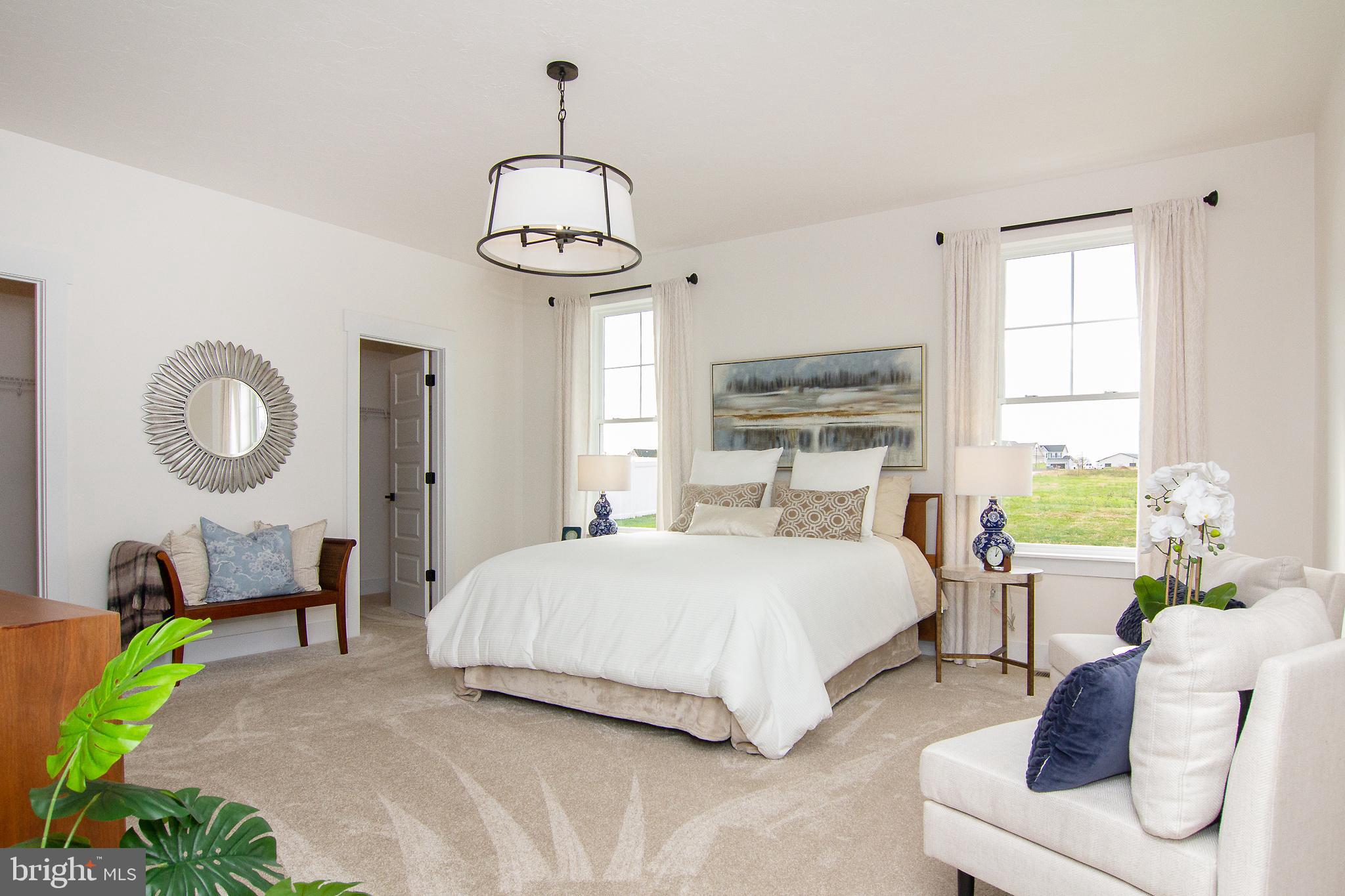 3913 St Pauls Road Manchester, MD 21102 - Photo 29 of 38 a bedroom with a bed mirror and window