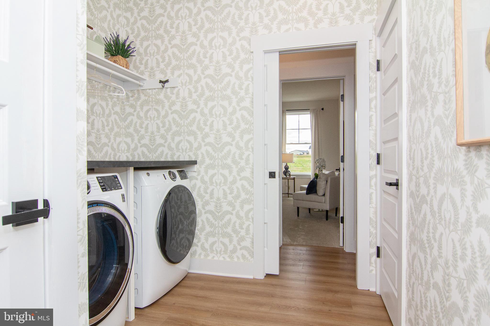 3913 St Pauls Road Manchester, MD 21102 - Photo 34 of 38 a view of a hallway with washer and dryer