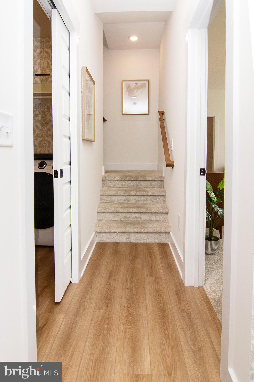 3913 St Pauls Road Manchester, MD 21102 - Photo 35 of 38 a view of a hallway with wooden floor and staircase
