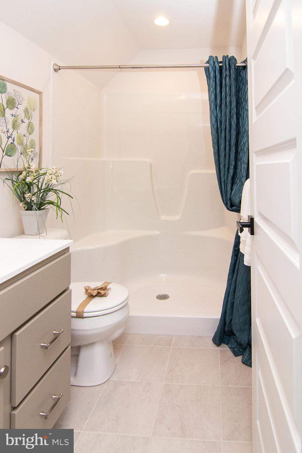 3913 St Pauls Road Manchester, MD 21102 - Photo 36 of 38 a bathroom with a toilet a sink and a bathtub