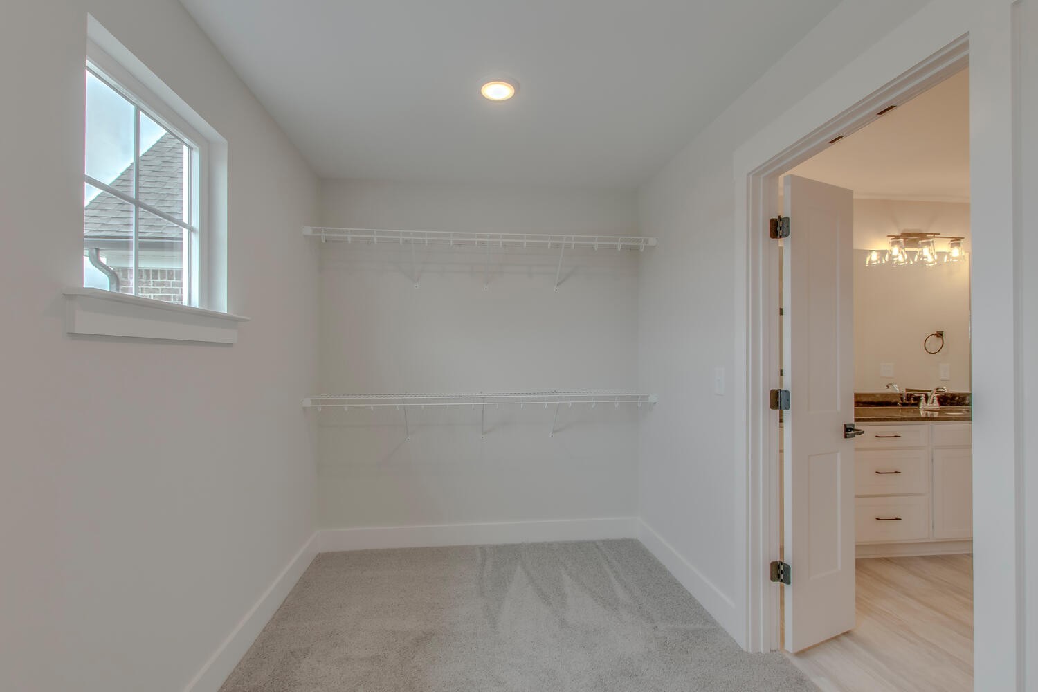 224 Tyler Cornerstone Trail Smyrna, TN 37167 - Photo 16 of 43 wooden floor in an empty room with a window