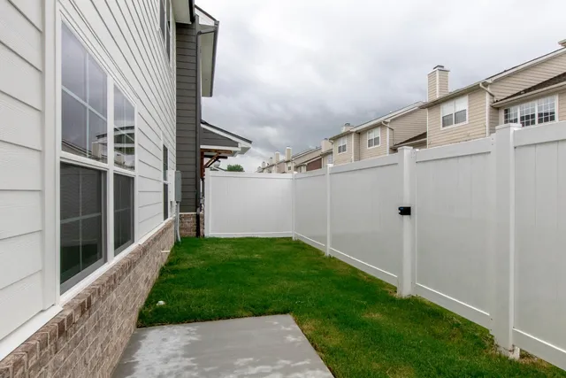a view of a back yard of the house