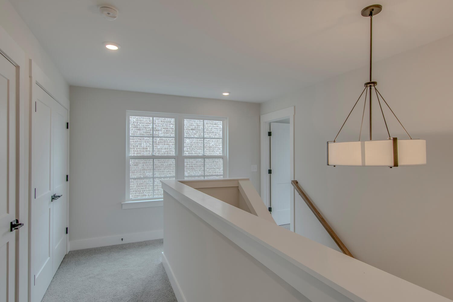 224 Tyler Cornerstone Trail Smyrna, TN 37167 - Photo 19 of 43 a living room with a couch and chandelier