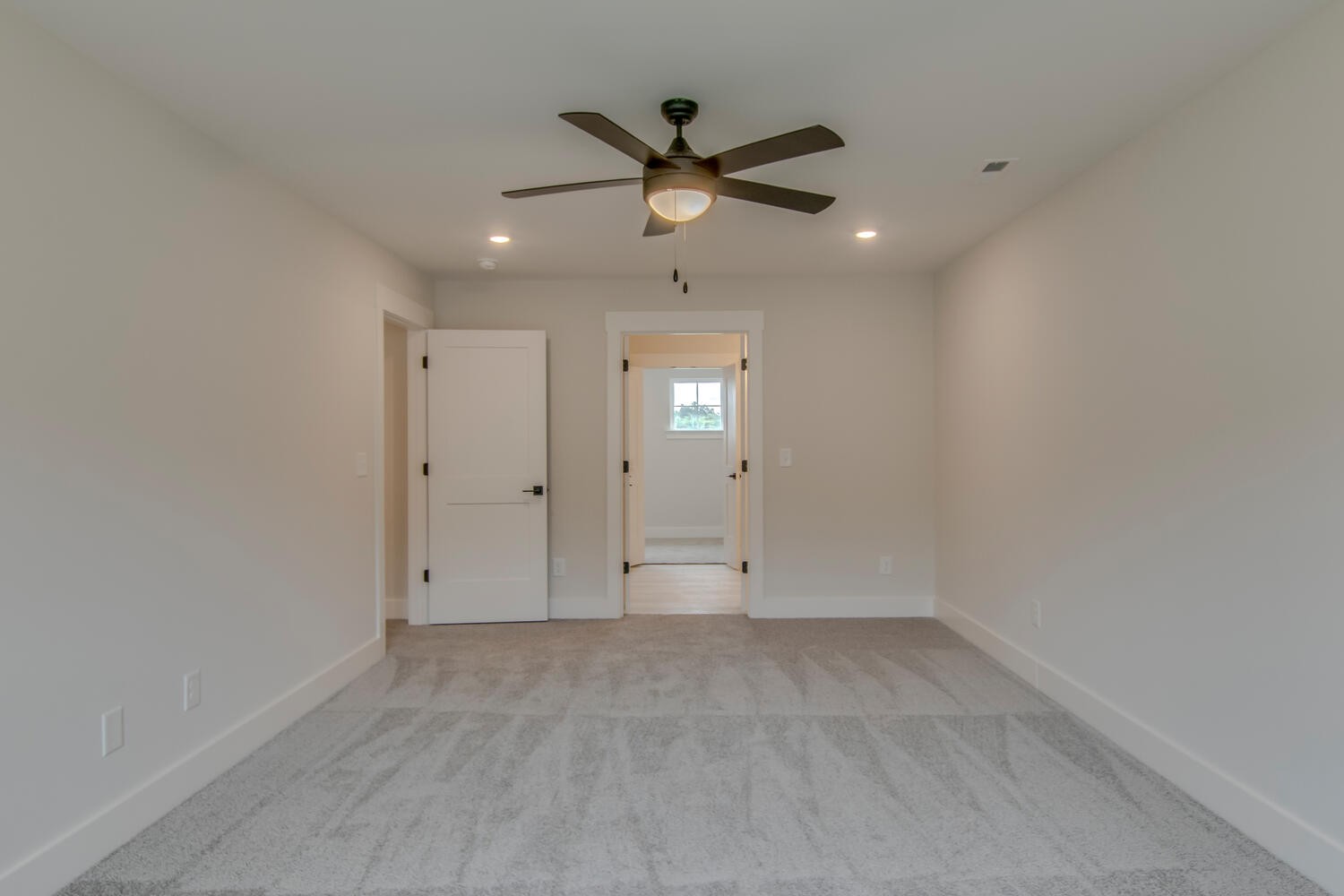 224 Tyler Cornerstone Trail Smyrna, TN 37167 - Photo 28 of 43 an empty room with ceiling fan and window
