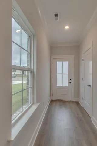 an empty room with windows