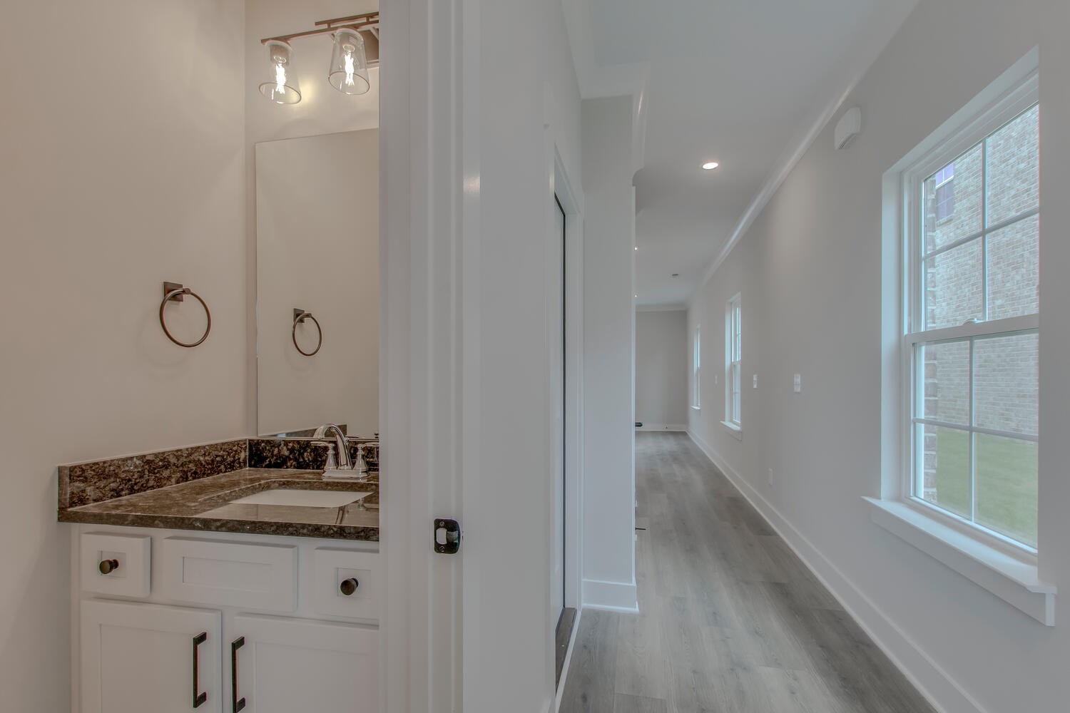 224 Tyler Cornerstone Trail Smyrna, TN 37167 - Photo 6 of 43 a bathroom with a sink a mirror and a shower