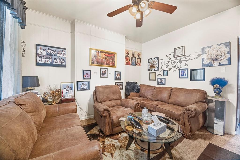 1136 Taggart Street McKees Rocks, PA 15136 - Photo 3 of 10 a living room with furniture and a couch