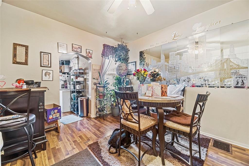1136 Taggart Street McKees Rocks, PA 15136 - Photo 4 of 10 a view of a dining room with furniture and a kitchen