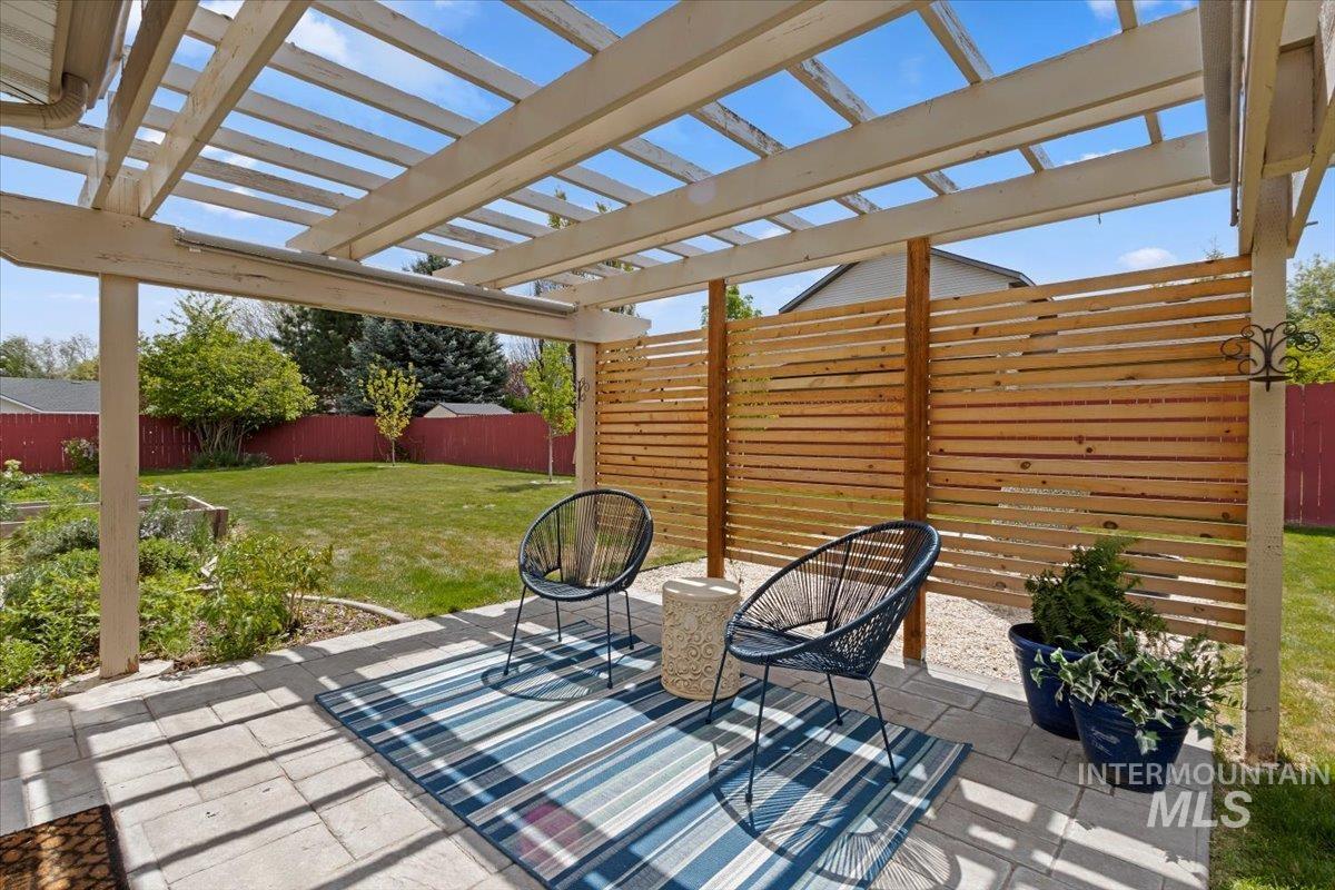 2274 Eastwood Road Twin Falls, ID 83301 - Photo 31 of 38 Paver patio with a white pergola structure