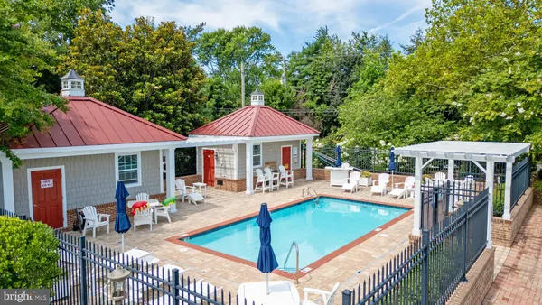 an outdoor space with seating area and furniture