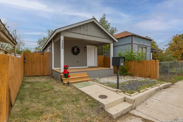 a front view of a house with entertaining space