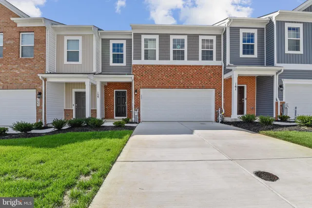 a front view of house with yard