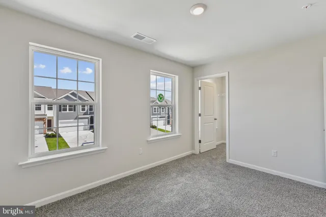 an empty room that has a window