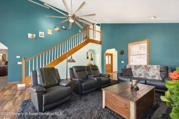 a living room with furniture and a window