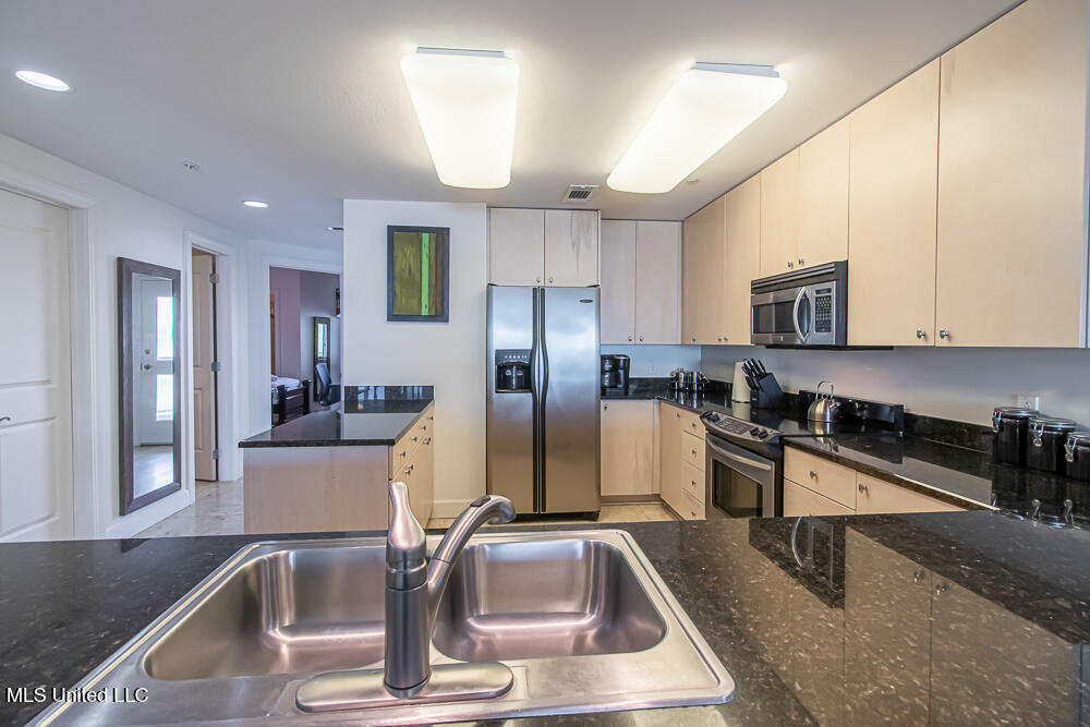 1899 Beach Boulevard, Unit 410 Biloxi, MS 39531 - Photo 4 of 35 Family room kitchen 1.4