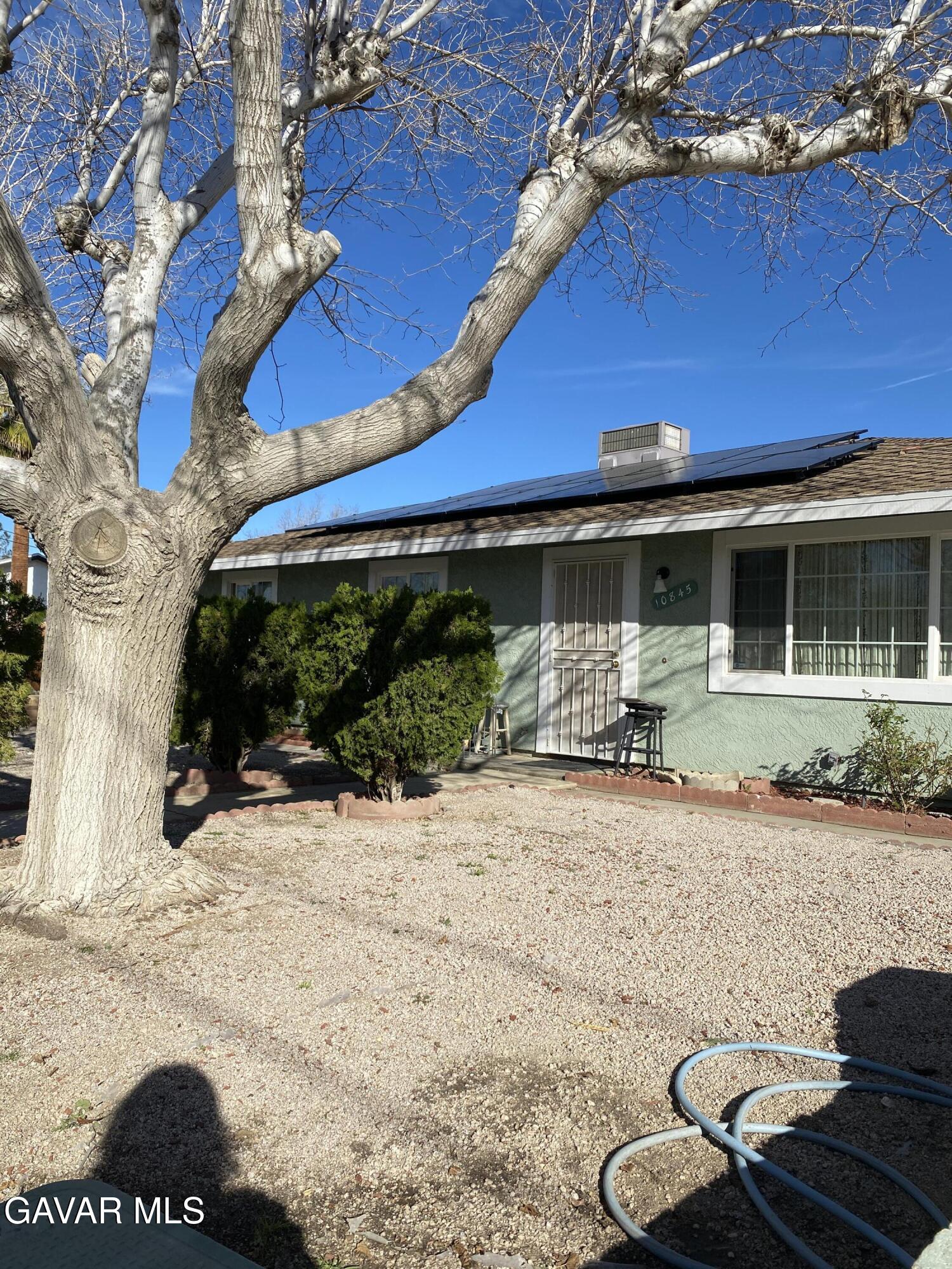10845 East Ave R-2 Littlerock, CA 93543 - Photo 2 of 4 a backyard of a house with seating space