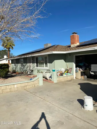 a view of a street with cars
