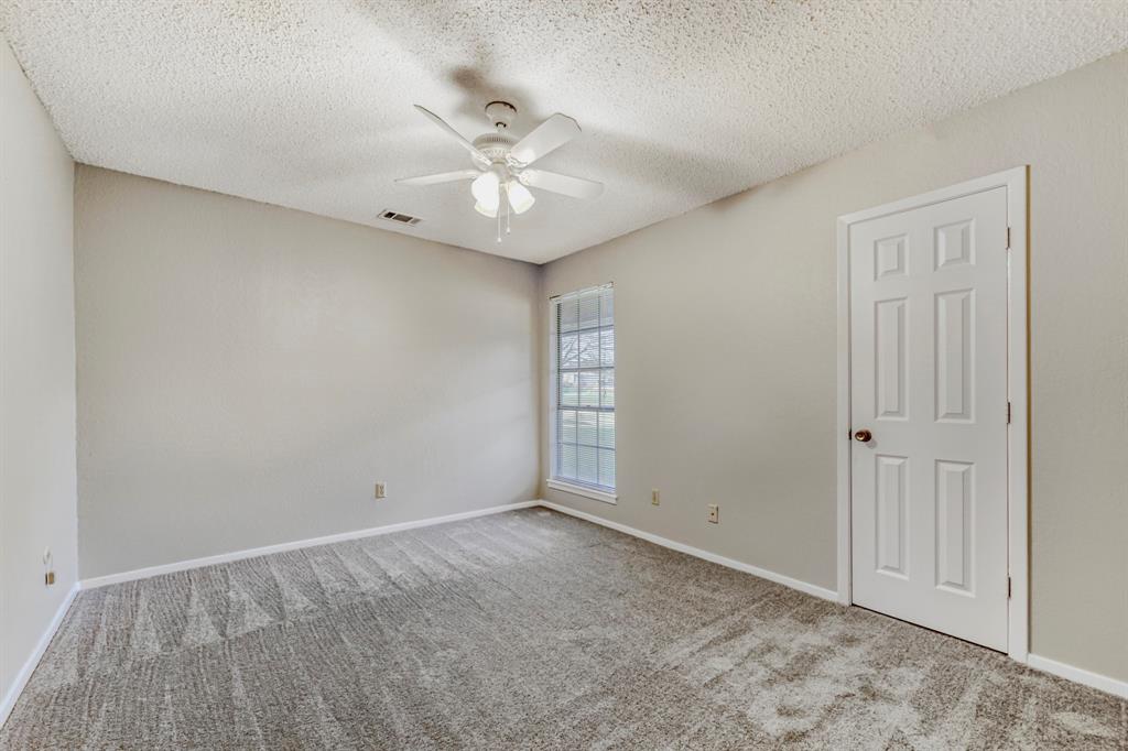 517 Kings Gate Road Willow Park, TX 76087 - Photo 21 of 28 a view of an empty room with a window