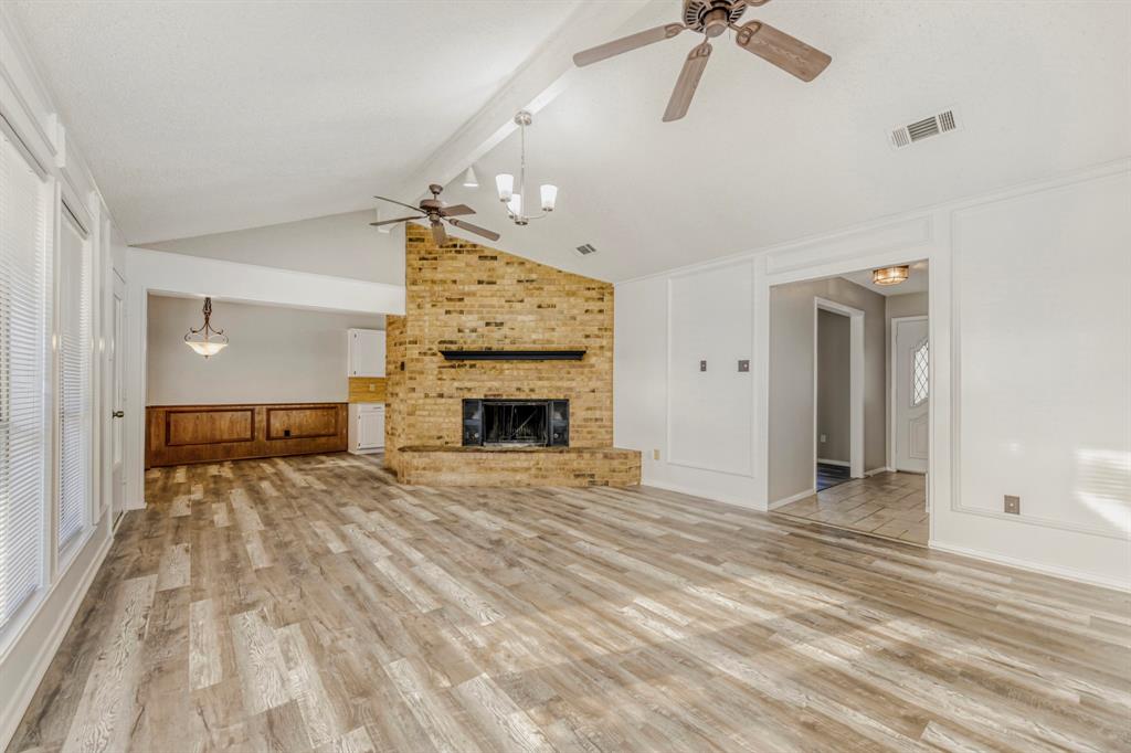 517 Kings Gate Road Willow Park, TX 76087 - Photo 7 of 28 a view of empty room with fireplace and fan