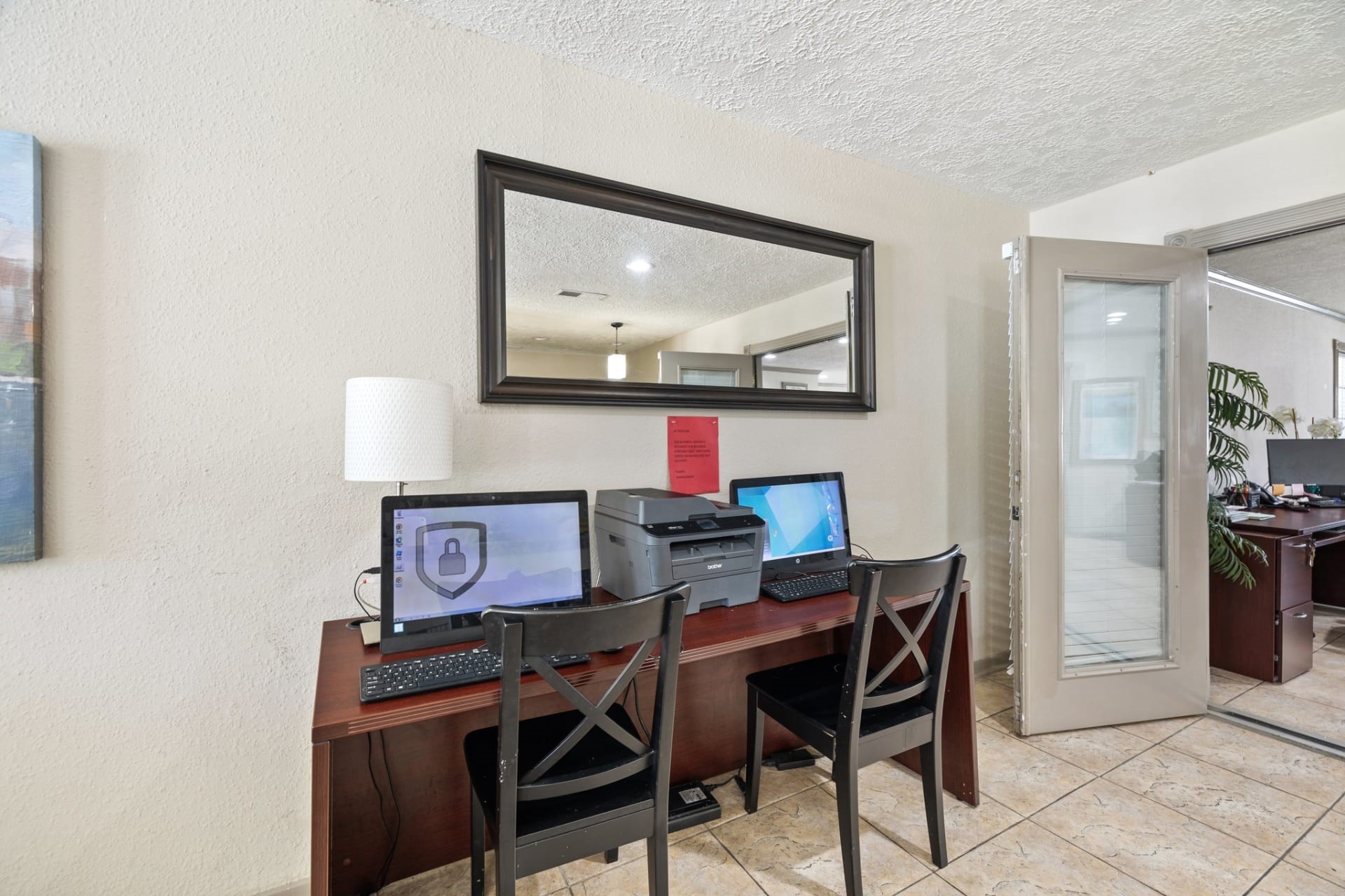 10101 Forum Park Drive, Unit 2047 Houston, TX 77036 - Photo 8 of 24 a view of a dining room with furniture and chandelier