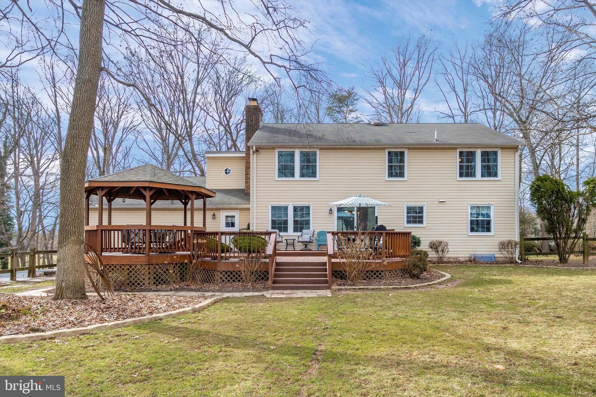 8137 Murphy Road Fulton, MD 20759 - Photo 39 of 56 a front view of a house with swimming pool and sitting area