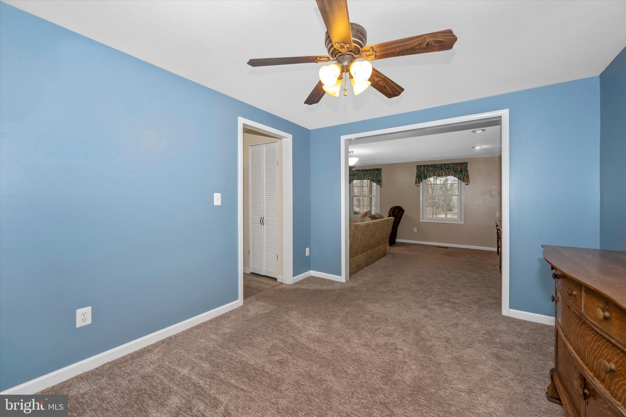 8137 Murphy Road Fulton, MD 20759 - Photo 6 of 56 a view of a hallway with a chandelier