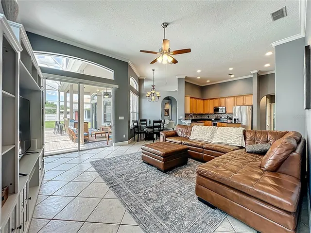 a living room with furniture and a table