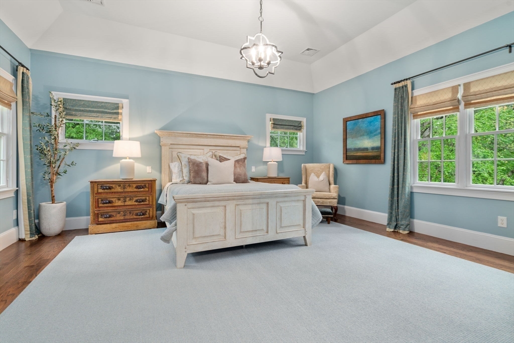 200 Edgewater Drive Needham, MA 02492 - Photo 22 of 41 a bedroom with bed and window