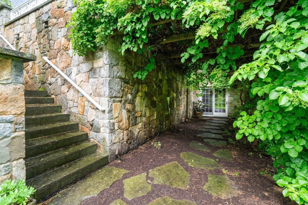 200 Edgewater Drive Needham, MA 02492 - Photo 37 of 41 a view of a yard with plants and large trees