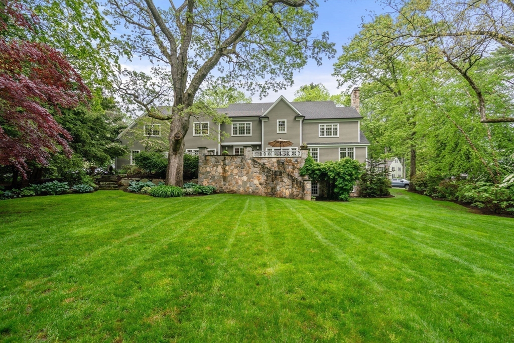 200 Edgewater Drive Needham, MA 02492 - Photo 38 of 41 a front view of a house with garden