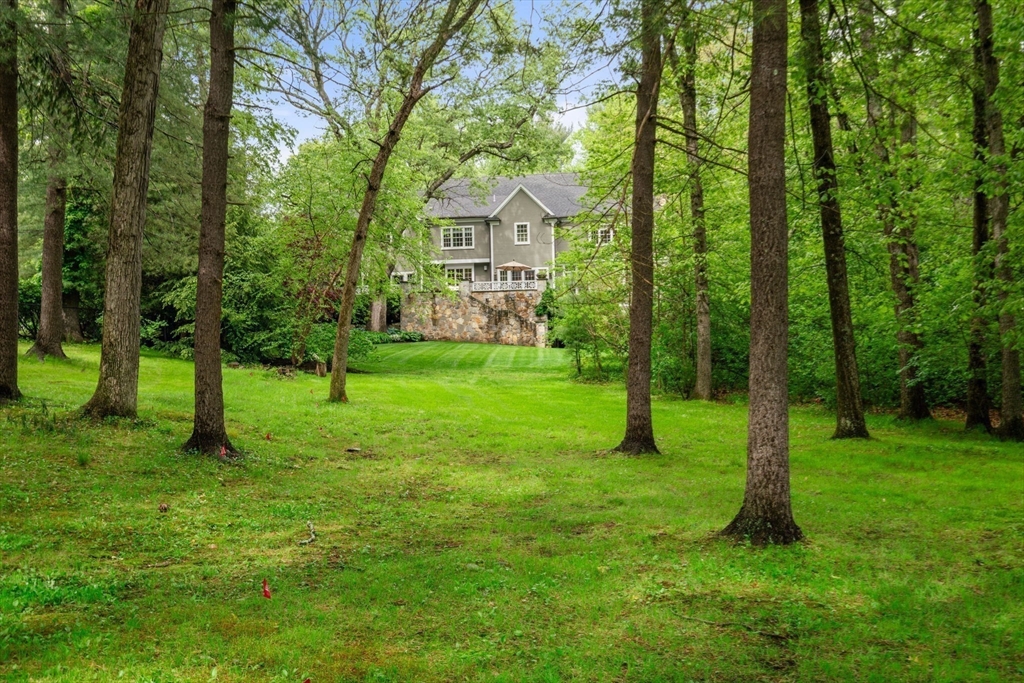 200 Edgewater Drive Needham, MA 02492 - Photo 40 of 41 a view of a house with a backyard