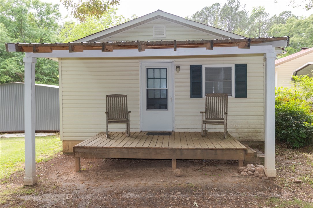 1116 Leatherdale Road Iva, SC 29655 - Photo 16 of 46 This cozy dwelling features a welcoming porch, perfect for enjoying peaceful moments outdoors.