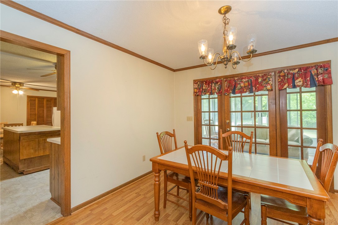1116 Leatherdale Road Iva, SC 29655 - Photo 2 of 46 This bright dining area offers an inviting atmosphere for everyday meals.