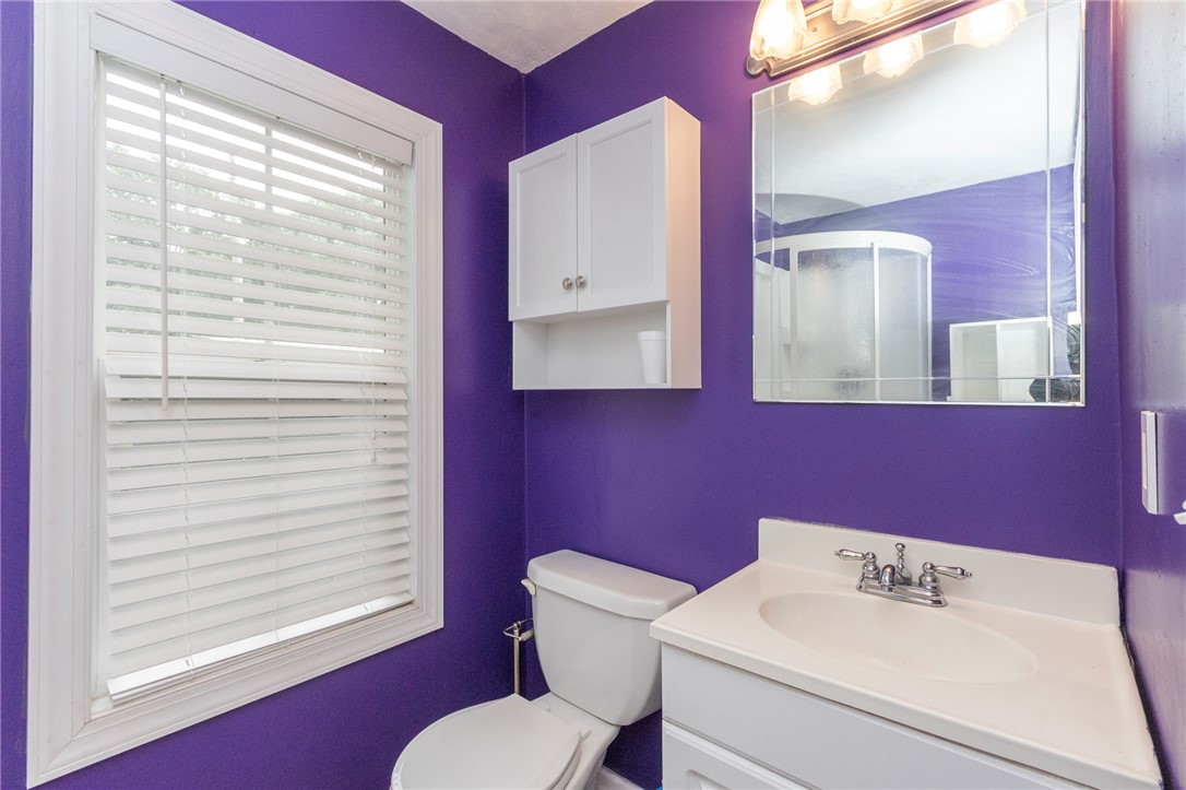 1116 Leatherdale Road Iva, SC 29655 - Photo 21 of 46 Bright bathroom with a practical vanity and accessible storage solutions.