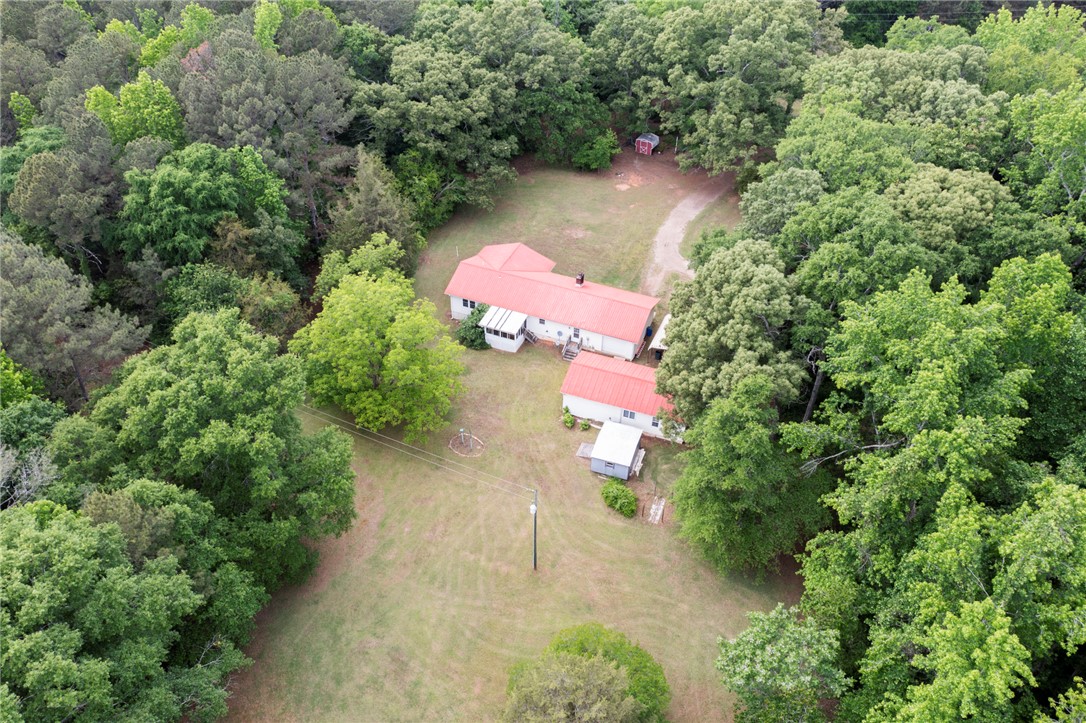 1116 Leatherdale Road Iva, SC 29655 - Photo 27 of 46 This secluded home offers a private yard surrounded by lush, mature trees.