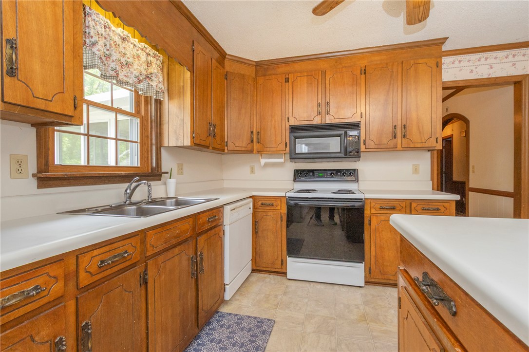 1116 Leatherdale Road Iva, SC 29655 - Photo 29 of 46 This functional kitchen features ample cabinetry and a bright window over the sink.