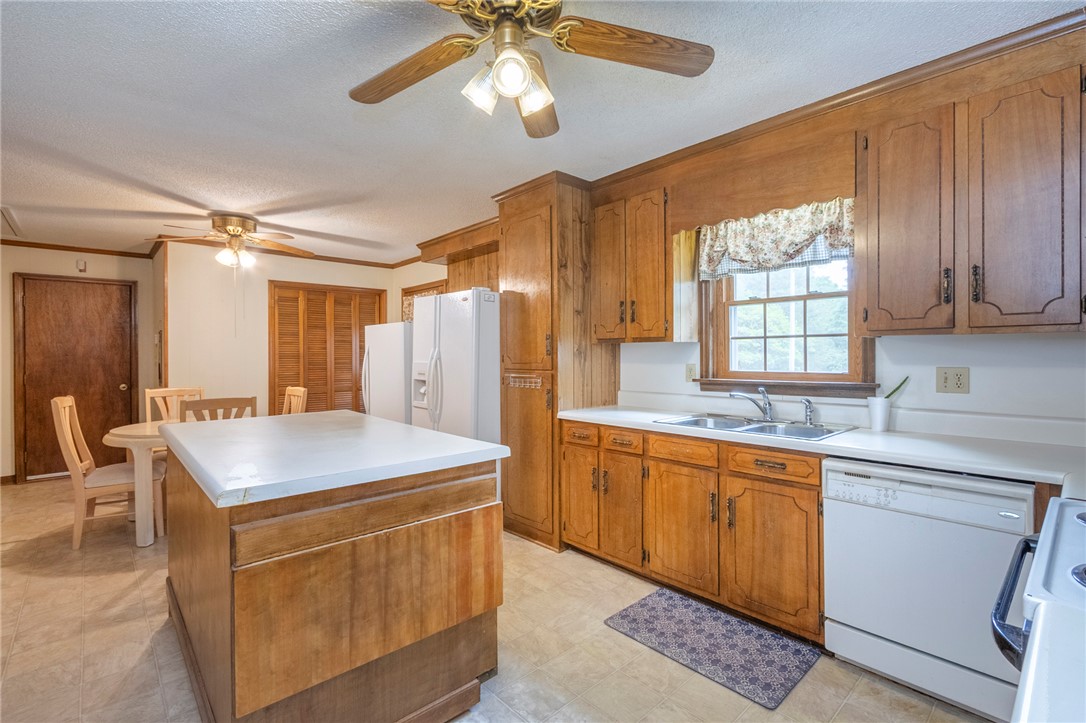 1116 Leatherdale Road Iva, SC 29655 - Photo 39 of 46 This spacious kitchen offers ample cabinetry, modern appliances, and a bright, functional layout.