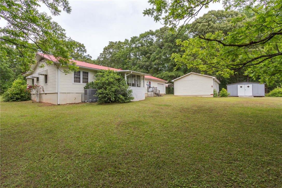 1116 Leatherdale Road Iva, SC 29655 - Photo 41 of 46 This spacious property offers a comfortable house with ample outdoor space and additional structures.