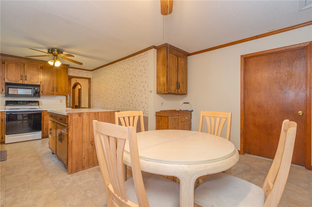 1116 Leatherdale Road Iva, SC 29655 - Photo 5 of 46 This spacious kitchen offers a functional layout and ample room for dining.