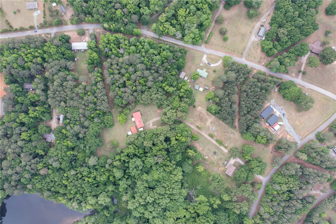 1116 Leatherdale Road Iva, SC 29655 - Photo 9 of 46 An aerial view captures the vast expanse of this serene, verdant property.