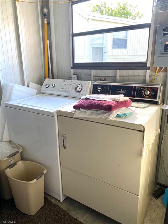 4561 Split Log Lane East Estero, FL 33928 - Photo 8 of 8 a utility room with dryer and washer