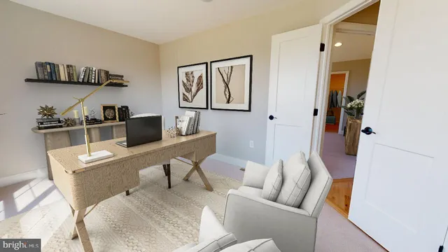 a work room with furniture and wooden floor