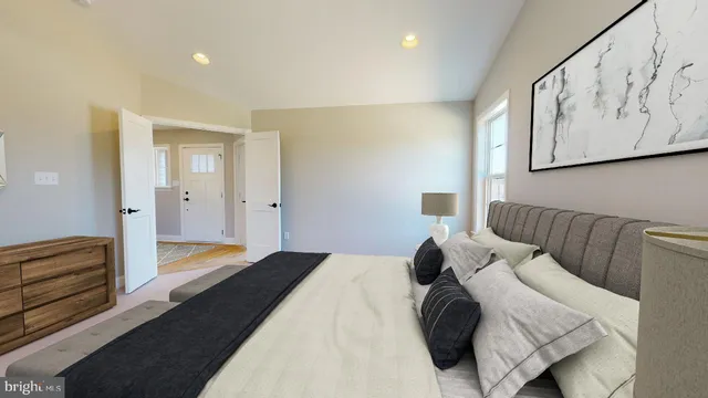 a bedroom with a bed and walk in closet