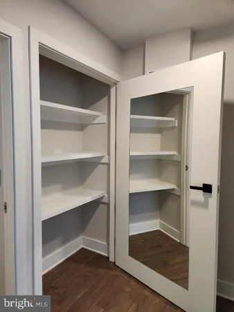 a bathroom with a sink a toilet and bathtub