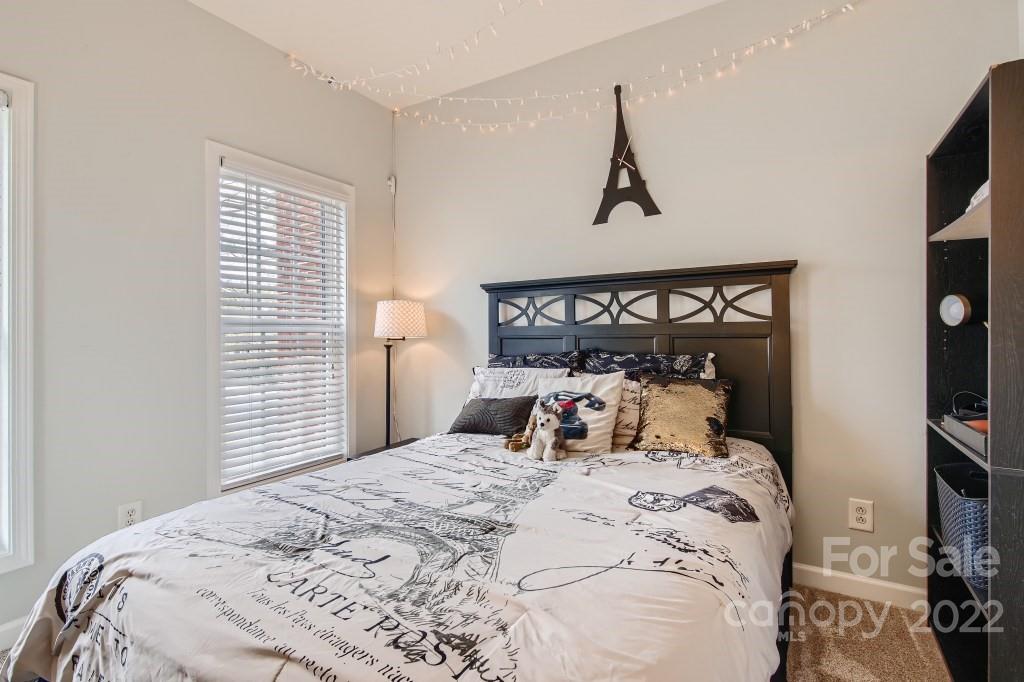 10461 Rocky Ford Club Road Charlotte, NC 28078 - Photo 14 of 27 a bedroom with a bed and a window