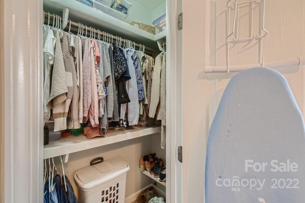 10461 Rocky Ford Club Road Charlotte, NC 28078 - Photo 23 of 27 a view of walk in closet with clothes and shoes